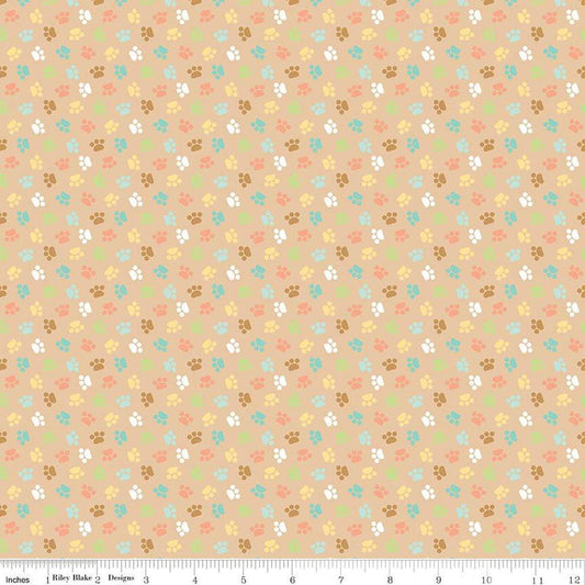 Image of the Pretty Kitty™ Paws Tan quilting cotton fabric by Doodlebug Design Inc for Riley Blake Designs. Features small paws on a tan background. Cute Little Fabric Shop
