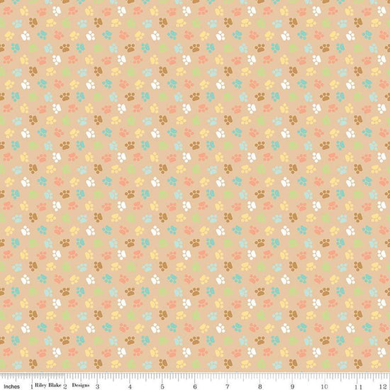Image of the Pretty Kitty™ Paws Tan quilting cotton fabric by Doodlebug Design Inc for Riley Blake Designs. Features small paws on a tan background. Cute Little Fabric Shop