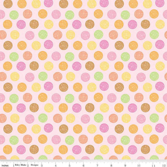 Image of the Pretty Kitty™ Yarn Dots Pink quilting cotton fabric by Doodlebug Design Inc for Riley Blake Designs. Features balls of yarn on a pink background. Cute Little Fabric Shop