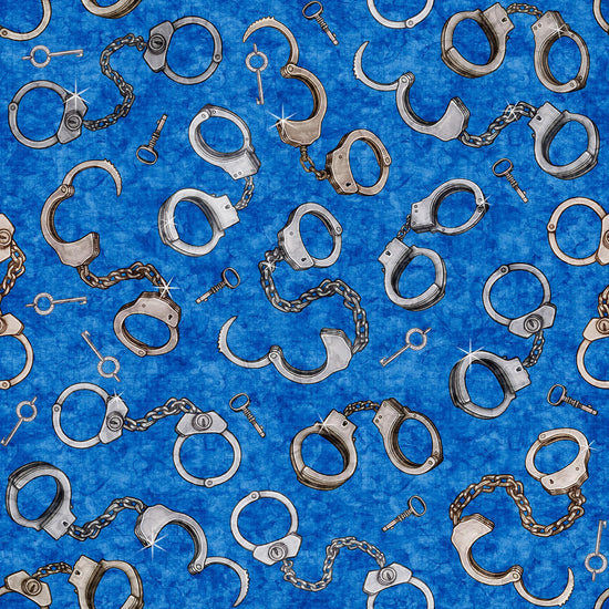 Image of the True Detective Hand Cuffs Blue quilting cotton fabrics by Morris Creative Group for QT Fabrics. Features shiny handcuffs on a blue background.
Cute Little Fabric Shop