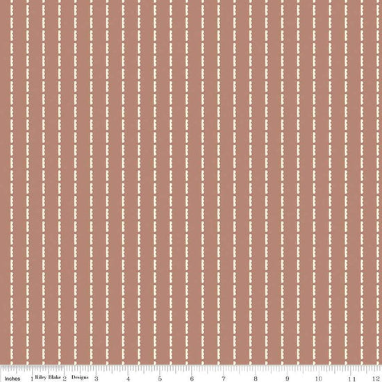 Blush 'n Butterscotch Clouds Dusty Rose quilting cotton fabric by Simple Simon & Company for Riley Blake Designs. Features striped clouds on a muted pink background. Cute Little Fabric Shop