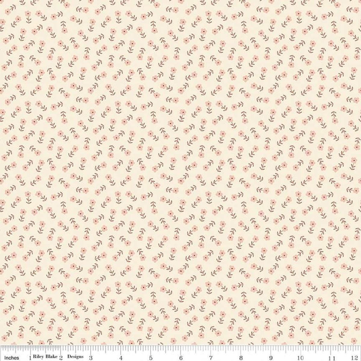 Blush 'n Butterscotch Ditsy Floral Cream quilting cotton fabric by Simple Simon & Company for Riley Blake Designs. Features small flowers on a cream background. Cute Little Fabric Shop