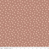 Blush 'n Butterscotch Dots Dusty Rose quilting cotton fabric by Simple Simon & Company for Riley Blake Designs. Features small dots on a pink background. Cute Little Fabric Shop