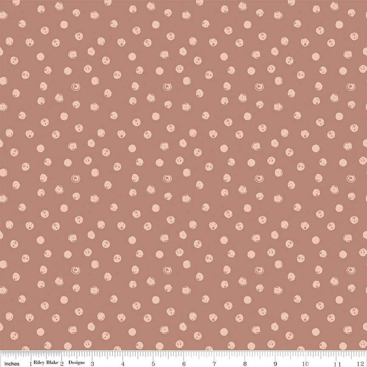 Blush 'n Butterscotch Dots Dusty Rose quilting cotton fabric by Simple Simon & Company for Riley Blake Designs. Features small dots on a pink background. Cute Little Fabric Shop