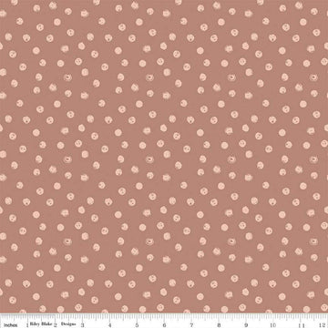 Blush 'n Butterscotch Dots Dusty Rose quilting cotton fabric by Simple Simon & Company for Riley Blake Designs. Features small dots on a pink background. Cute Little Fabric Shop
