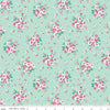Image of the Precious Petites Main Mint quilting cotton fabric by Gerri Robinson for Riley Blake Designs. Features flowers on a green background. Cute Little Fabric Shop