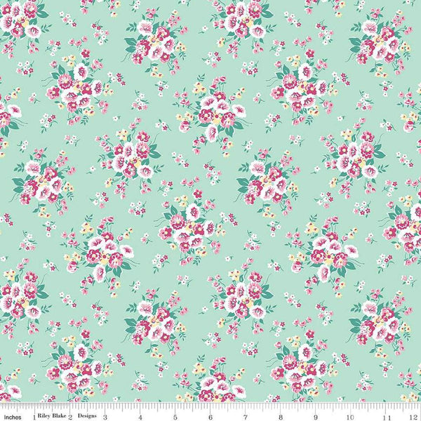 Image of the Precious Petites Main Mint quilting cotton fabric by Gerri Robinson for Riley Blake Designs. Features flowers on a green background. Cute Little Fabric Shop