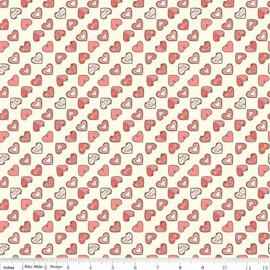 Image of the Besties Charms Vanilla quilting cotton fabric by Corinne Wells for Riley Blake Designs. Features hearts on a cream background. Cute Little Fabric Shop
