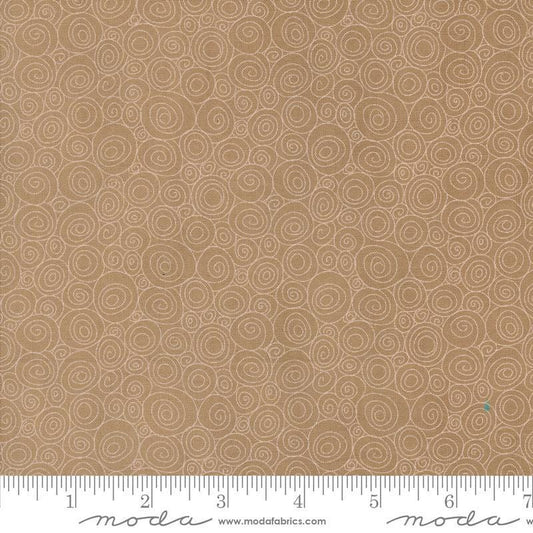 Image of the Sunday Brunch Grits Tea quilting cotton fabric by Moda Fabrics. Features swirls on a tan background. Cute Little Fabric Shop