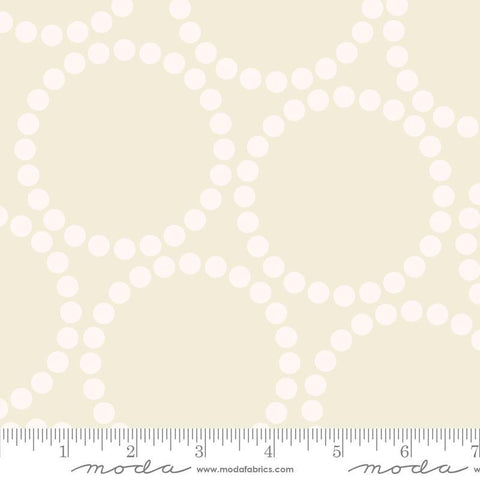 Image of the Pearl Bracelet Eggshell White quilting cotton fabric by Lizzy House for Moda Fabrics. Features circles made up of small dots on a cream background. 
Cute Little Fabric Shop