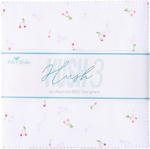 Image of the Hush Hush 3 5 inch stacker by Riley Blake Designs. Features low volume fabrics on white and cream backgrounds. 
Cute Little Fabric Shop