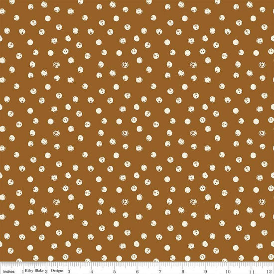 Blush 'n Butterscotch Dots Cinnamon quilting cotton fabric by Simple Simon & Company for Riley Blake Designs. Features small dots on a brown background. Cute Little Fabric Shop
