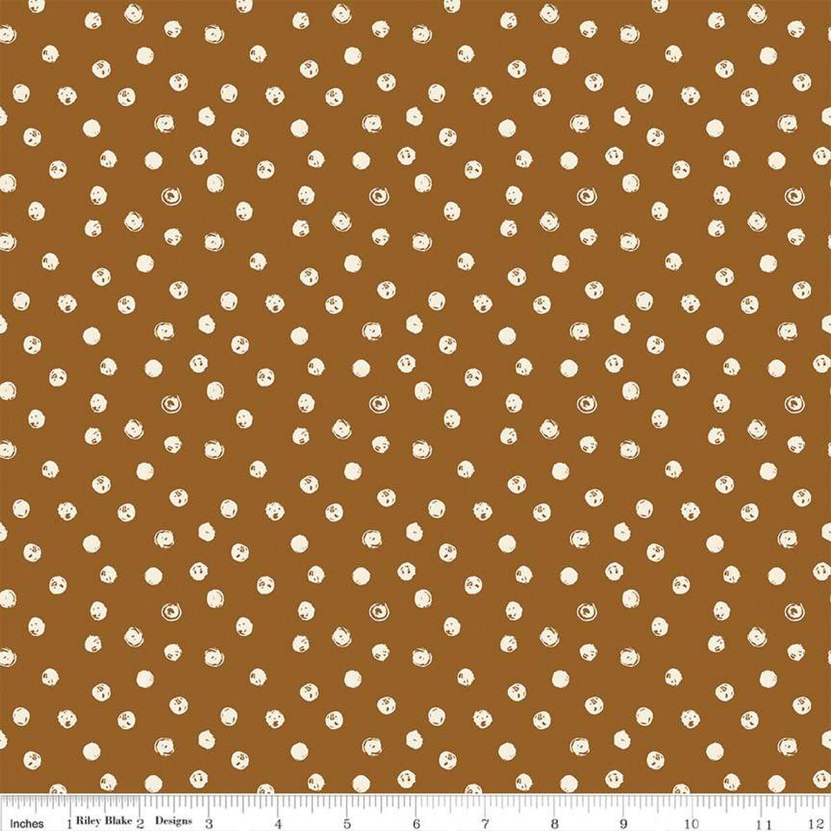 Blush 'n Butterscotch Dots Cinnamon quilting cotton fabric by Simple Simon & Company for Riley Blake Designs. Features small dots on a brown background. Cute Little Fabric Shop