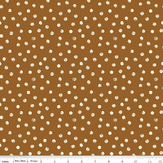 Blush 'n Butterscotch Dots Cinnamon quilting cotton fabric by Simple Simon & Company for Riley Blake Designs. Features small dots on a brown background. Cute Little Fabric Shop
