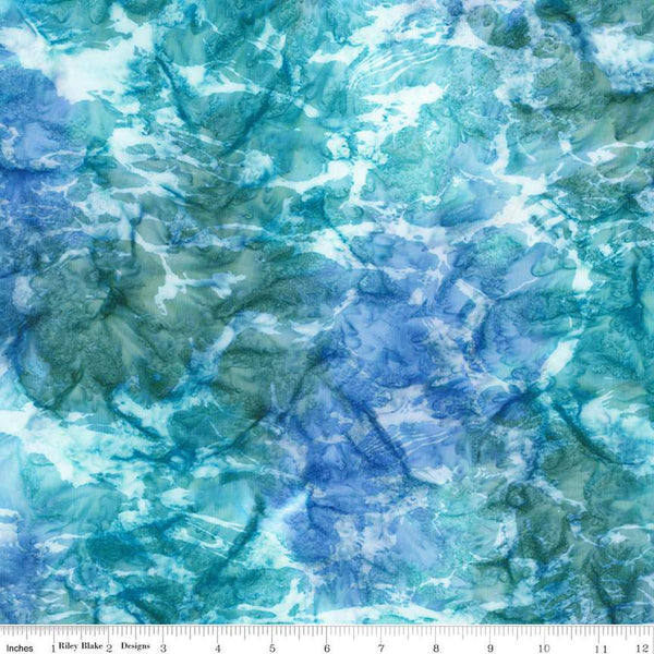 Image of the Batiks Toes in the Sand Denim Bijou quilting cotton batik fabric. Features abstract hand-dyed patterns. Cute Little Fabric Shop