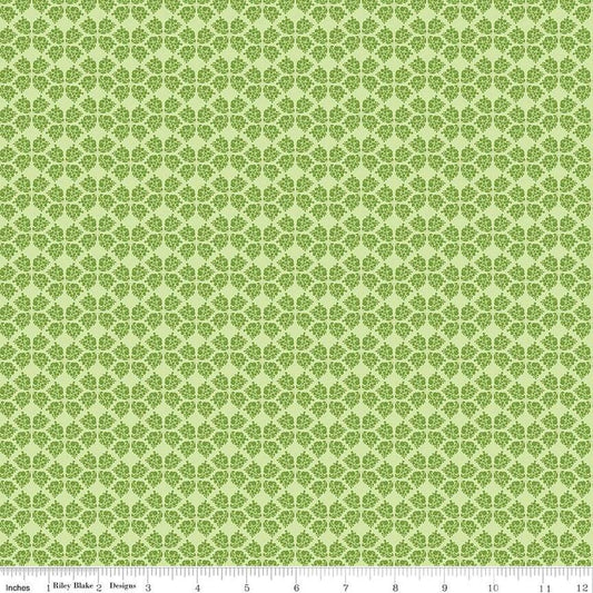 Image of the Plum Petals Geometric Fern quilting cotton fabric by Diane Labombarbe for Riley Blake Designs. Features geometric flowers on a purple background. Cute Little Fabric Shop