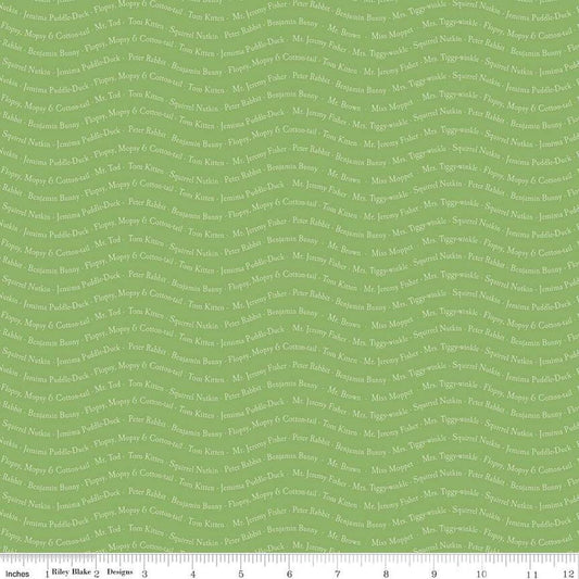 Image of the Peter Rabbit and Friends Text Green quilting cotton fabric by Beatrix Potter for Riley Blake Designs. Features text on a green background. Cute Little Fabric Shop