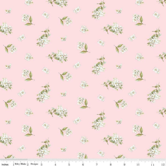 Image of the Peter Rabbit and Friends Jasmine Pink quilting cotton fabric by Beatrix Potter for Riley Blake Designs. Features sprigs of flowers on a pink background. Cute Little Fabric Shop
