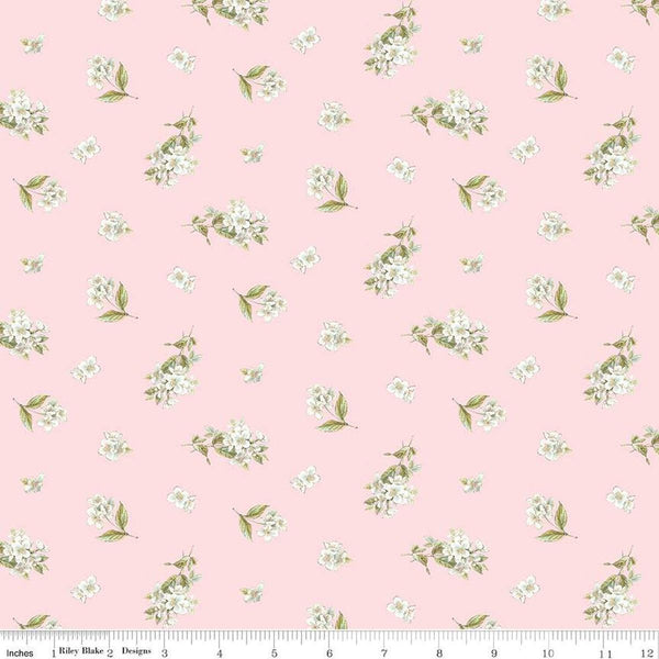 Image of the Peter Rabbit and Friends Jasmine Pink quilting cotton fabric by Beatrix Potter for Riley Blake Designs. Features sprigs of flowers on a pink background. Cute Little Fabric Shop