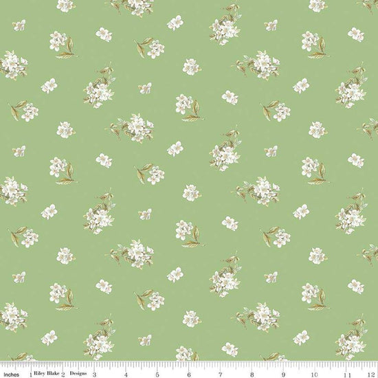 Image of the Peter Rabbit and Friends Jasmine Green quilting cotton fabric by Beatrix Potter for Riley Blake Designs. Features sprigs of flowers on a green background. Cute Little Fabric Shop