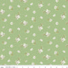 Image of the Peter Rabbit and Friends Jasmine Green quilting cotton fabric by Beatrix Potter for Riley Blake Designs. Features sprigs of flowers on a green background. Cute Little Fabric Shop