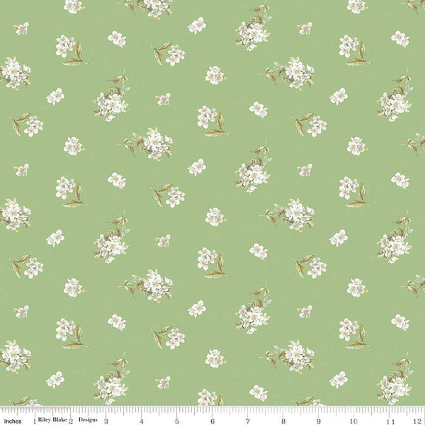 Image of the Peter Rabbit and Friends Jasmine Green quilting cotton fabric by Beatrix Potter for Riley Blake Designs. Features sprigs of flowers on a green background. Cute Little Fabric Shop