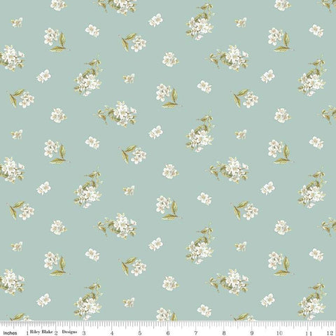 Image of the Peter Rabbit and Friends Jasmine Blue quilting cotton fabric by Beatrix Potter for Riley Blake Designs. Features sprigs of flowers on a blue background. Cute Little Fabric Shop