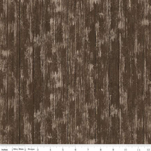 Image of the Covered Bridges in Spring Barn Wood Brown by Quilting Cotton Fabric. Features a wood grain fabric on a brown background. Cute Little Fabric Shop