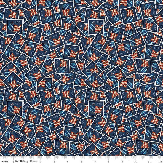 Image of the Letters From Home Stamps Navy quilting cotton fabric by Riley Blake Designs. Features American themed prints on a navy background. Cute Little Fabric Shop