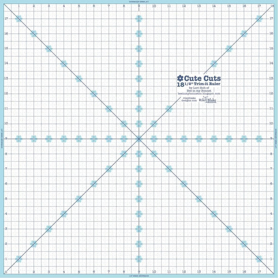 Image of the Cute Cuts™ Trim-it™ Ruler 18.5 x 18.5 by Lori Holt for Riley Blake Designs. Features an 18.5 inch square ruler with aqua borders. 
Cute Little Fabric Shop