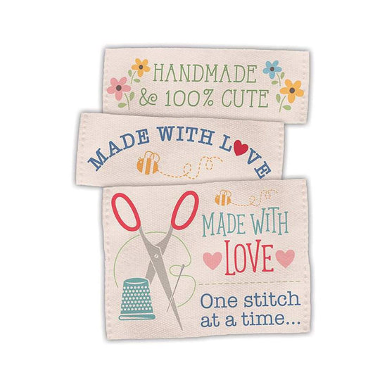 Image of the Made With Love Woven Labels by Lori Holt for Riley Blake Designs. Features labels with quotes to be sewn into a product. 
Cute Little Fabric Shop