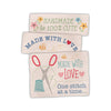 Image of the Made With Love Woven Labels by Lori Holt for Riley Blake Designs. Features labels with quotes to be sewn into a product. 
Cute Little Fabric Shop