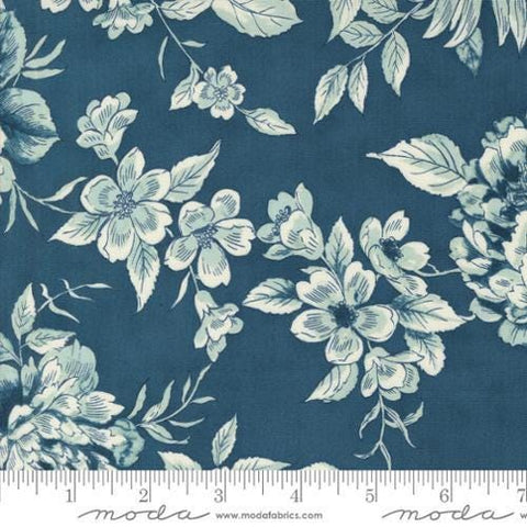 Image of the Sandalwood Camellia Indigo quilting cotton fabric by 3 Sisters for Moda Fabrics. Features a floral fabric on a blue background. Cute Little Fabric Shop