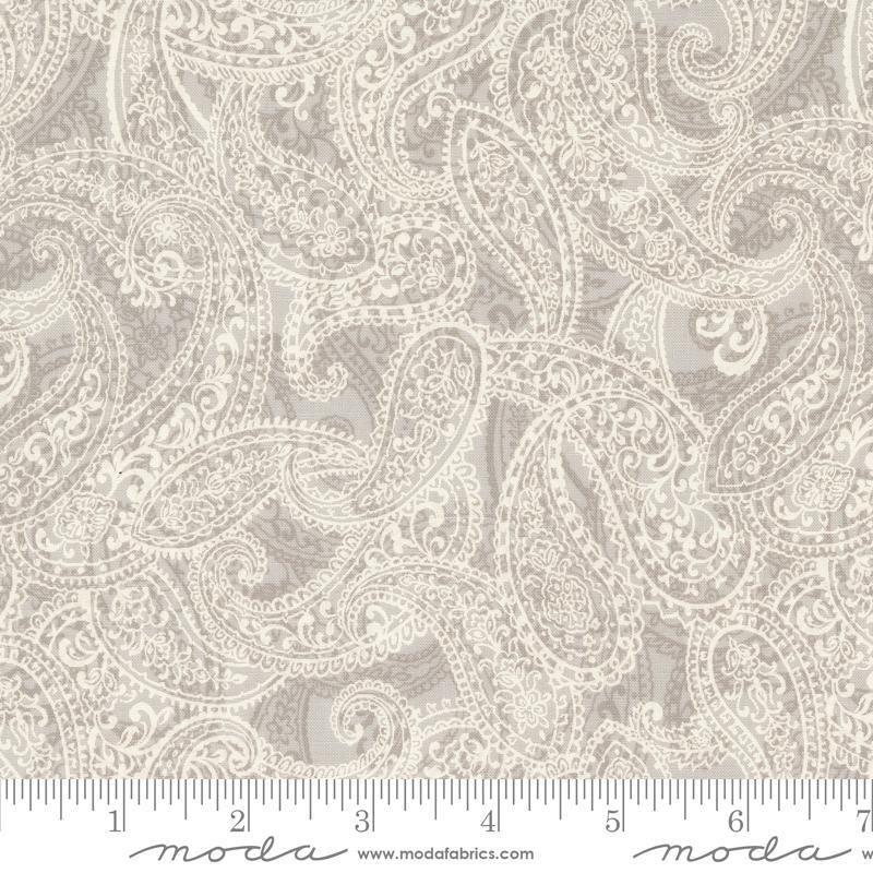 Image of the Sandalwood Adeline Moonbeam quilting cotton fabric by 3 Sisters for Moda Fabrics. Features a floral fabric on a gray background. Cute Little Fabric Shop