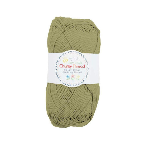 Image of the Chunky Thread Sage sport weight thread by Lori Holt for Riley Blake Designs. Features a muted green thread. 
Cute Little Fabric Shop