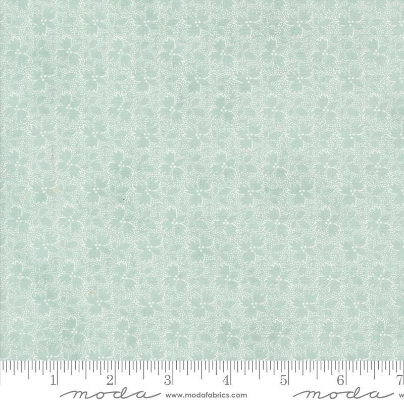 Image of the Sandalwood Harmony Eucalyptus quilting cotton fabric by 3 Sisters for Moda Fabrics. Features a floral fabric on a blue background. Cute Little Fabric Shop