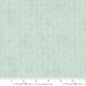 Image of the Sandalwood Harmony Eucalyptus quilting cotton fabric by 3 Sisters for Moda Fabrics. Features a floral fabric on a blue background. Cute Little Fabric Shop