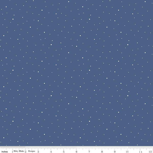 Image of the Wide Back Dapple Dot Denim quilting cotton fabric by Riley Blake Designs.Features white dots on a denim background. 
Cute Little Fabric Shop