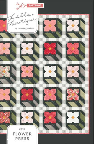 Image of the Flower Press quilt pattern by Lella Boutique for Moda Fabrics. Features flowers and leaves on a quilt.
Cute Little Fabric Shop