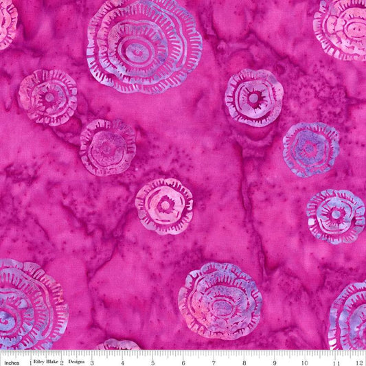 Image of the Expressions Batiks Bedazzled! Lollipop quilting cotton fabric by Pat Fryer for Riley Blake Designs. Features a flower pattern on a pink background. 
Cute Little Fabric Shop