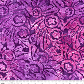 Image of the Expressions Batiks Bedazzled! Grape Soda quilting cotton fabric by Pat Fryer for Riley Blake Designs. Features a flower pattern on a purple background. 
Cute Little Fabric Shop