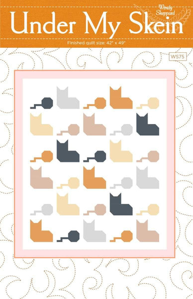 Image of the Under my Skein quilt pattern by Wendy Sheppard for Riley Blake Designs. Features cars and balls of yarn on a quilt. 
Cute Little Fabric Shop