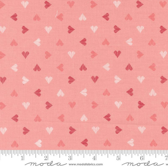 Image of the Love Blooms Sweetheart Blush quilting cotton fabric by Moda Fabrics. Features a checkered pattern on a pink background. Cute Little Fabric Shop