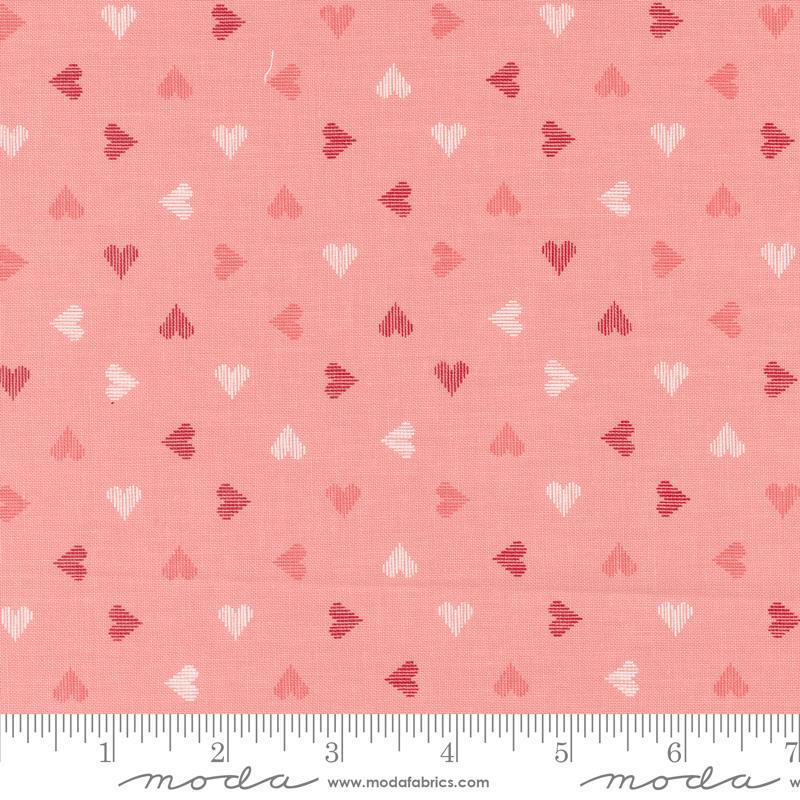 Image of the Love Blooms Sweetheart Blush quilting cotton fabric by Moda Fabrics. Features a checkered pattern on a pink background. Cute Little Fabric Shop