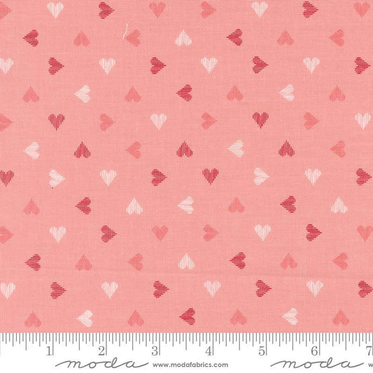 Image of the Love Blooms Sweetheart Blush quilting cotton fabric by Moda Fabrics. Features a checkered pattern on a pink background. Cute Little Fabric Shop