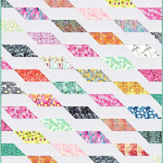 Image of the Rockslide quilt pattern by Slice of Pi Quilts by Riley Blake Designs. Features diamond shapes on a quilt. 
Cute Little Fabric Shop