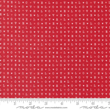 Image of the Love Blooms LOVE Rose quilting cotton fabric by Moda Fabrics. Features the word LOVE on a red background. Cute Little Fabric Shop