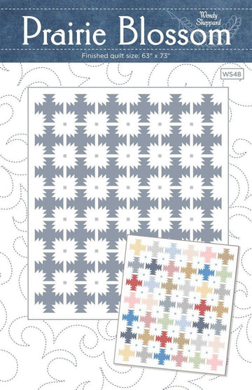 Image of the Prairie Blossom quilt pattern by Wendy Sheppard for Riley Blake Designs. Features star patterns on a quilt. 
Cute Little Fabric Shop
