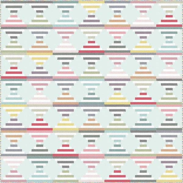 Image of the Candy Logs quilt pattern by Wendy Sheppard for Riley Blake Designs. Features stripes in diamond shapes. 
Cute Little Fabric Shop