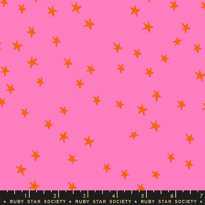Image of the Starry Blenders Star Vivid Pink quilting cotton fabric by Alexia Abegg for Moda Fabrics. Features small scattered stars on a pink background. Cute Little Fabric Shop
